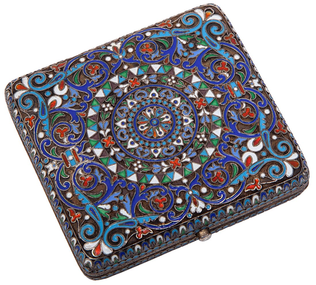 A RUSSIAN GILT SILVER AND CLOISONNE ENAMEL CIGARETTE CA: A RUSSIAN GILT SILVER AND CLOISONNE ENAMEL CIGARETTE CASE, CYRILLIC MAKERS MARK NA, ST. PETERSBURG, the exterior ornately decorated with scrolling foliate designs arranged in concentric circles, the g