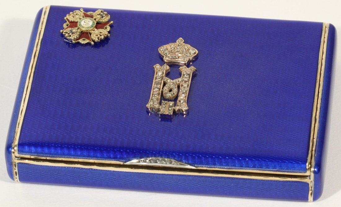 FABERGE ANTIQUE RUSSIAN GUILLOCHE ENAMEL CIGARETTE CASE: AN IMPERIAL GUILLOCHE ENAMEL CIGARETTE CASE WITH IMPERIAL CYPHER AND ORDER, FABERGE, SAINT PETERSBURG, 1899-1908, of rectangular form, the body with translucent cobalt blue enamel over a wavy engine-t