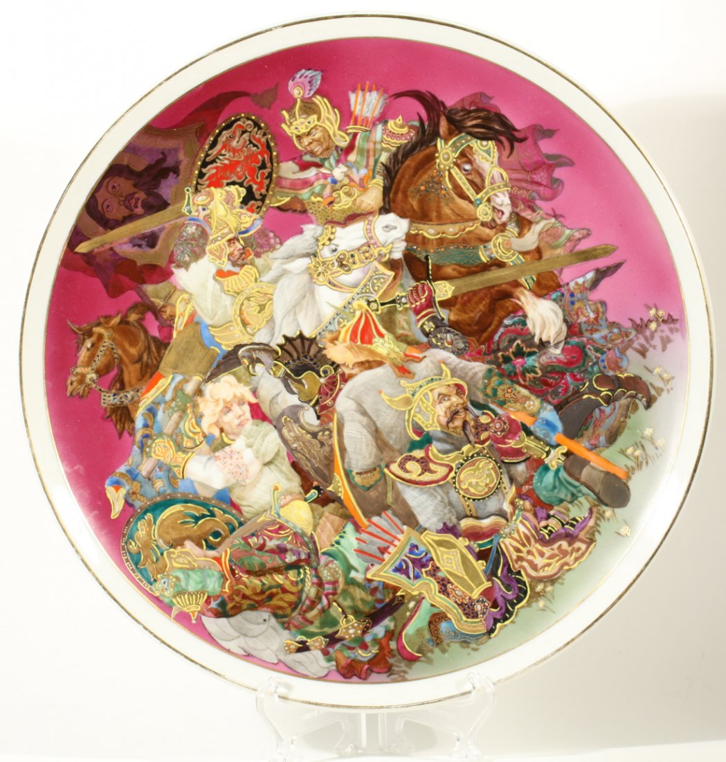 ANTIQUE SOVIET PORCELAIN CHARGER PLATE BARANOVKA: A HAND-PAINTED SOVIET PORCELAIN CHARGER PLATE, V. KRAVTSEVICH, BARANOVSKY PORCELAIN FACTORY, BARANOVKA, 1953 , the ornately decorated and gilded plate depicts a battle between Russian and Mongol warri