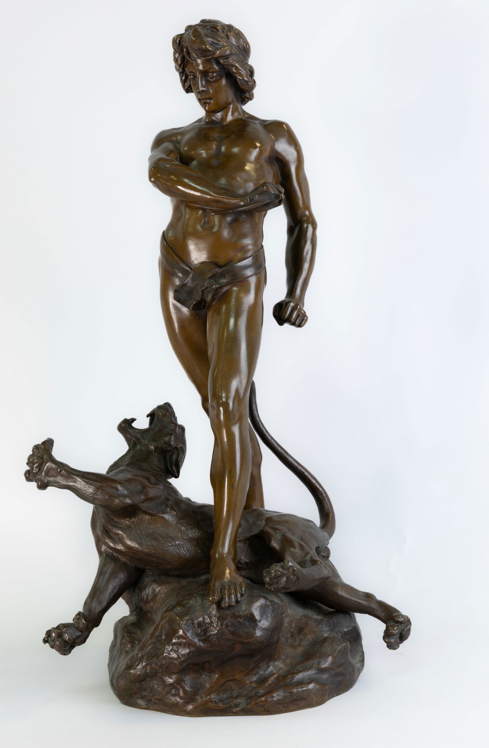 LOUIS POTET (FRENCH B1866): LOUIS POTET (FRENCH B1866) Le Vainqueur du Lion, bronze height: 56.5 cm (22 1/4 in) inscribed with signature on base impressed with Paris Exposition 1900 Medaille d'Or foundry seal Keywords: French An