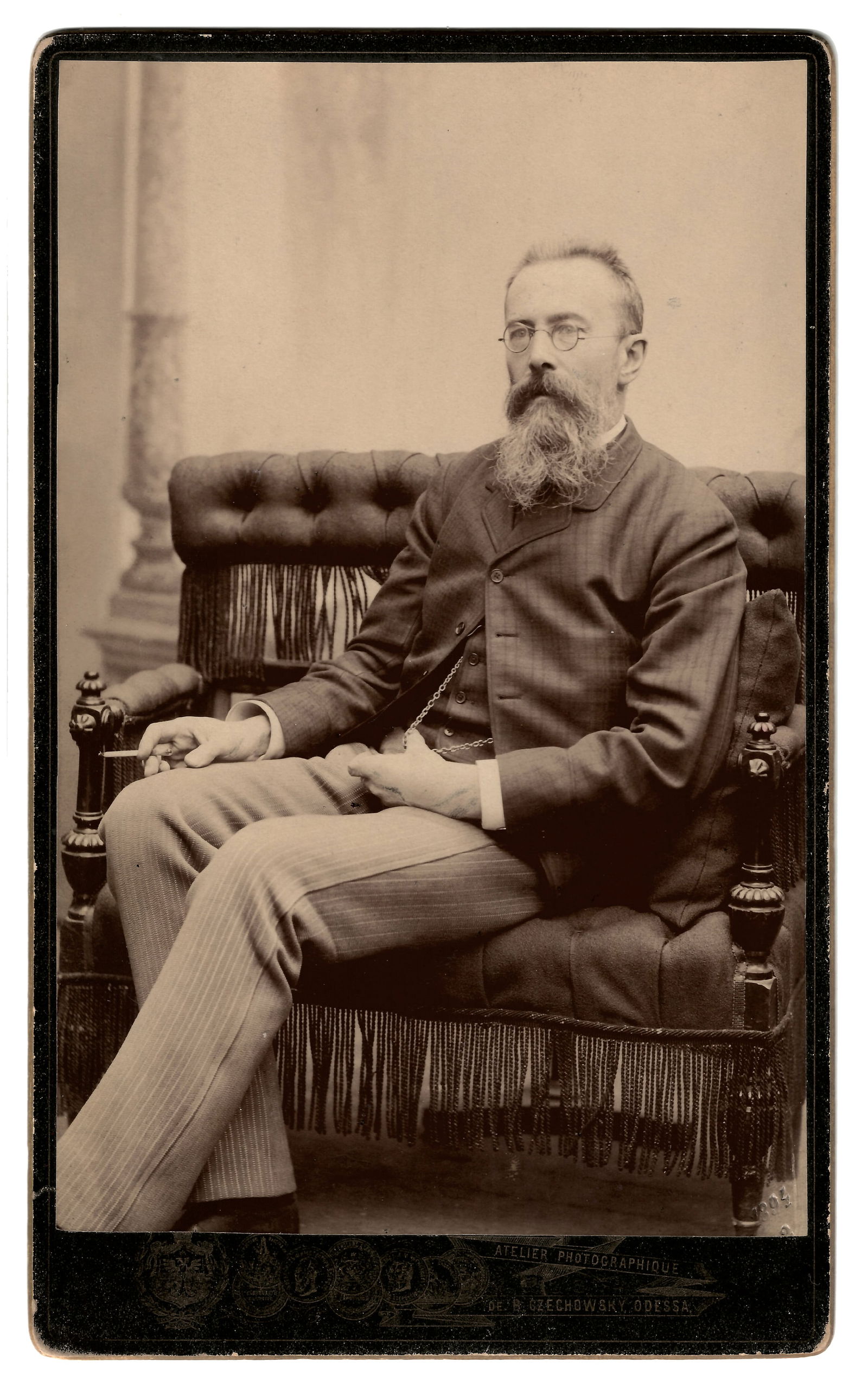 NIKOLAI RIMSKY-KORSAKOV Signed & Inscribed Cabinet Card, c. 1890s: NIKOLAI RIMSKY-KORSAKOV Signed & Inscribed Cabinet Card, c. 1890s Nikolai Rimsky-Korsakov Signed & Inscribed Cabinet Card, Odessa, Ukraine, ca. 1890s Signed photograph A sepia-toned photograph depicti