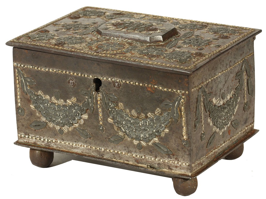 A RUSSIAN PARCEL GILT STEEL AND METAL INLAID CASKET,: A RUSSIAN PARCEL GILT STEEL AND METAL INLAID CASKET, TULA, 19TH C., of rectangular form, supported by four ball feet, the hinged cover ornamented by flower bouquets with parcel-gilt leaves, the side p