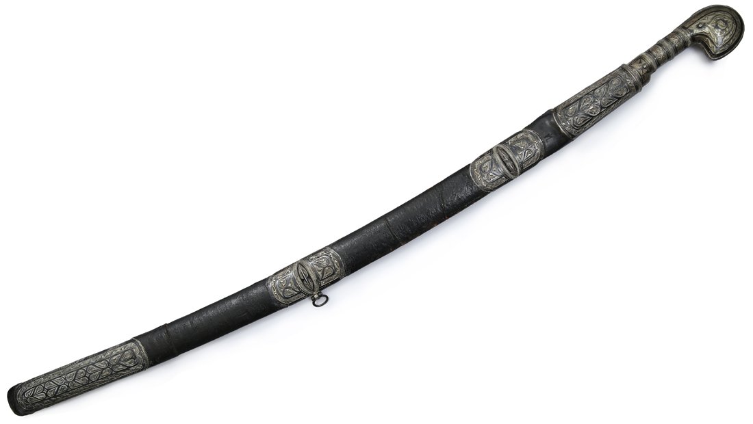 A GILT SILVER AND NIELLO MOUNTED CAUCASIAN SHASHKA WITH: A GILT SILVER AND NIELLO MOUNTED CAUCASIAN SHASHKA WITH GOLD INLAYS AND SERPENT DECORATION the curved blade inlaid on one side with a gold serpent and a similar but small symbol beneath it, with Arabi