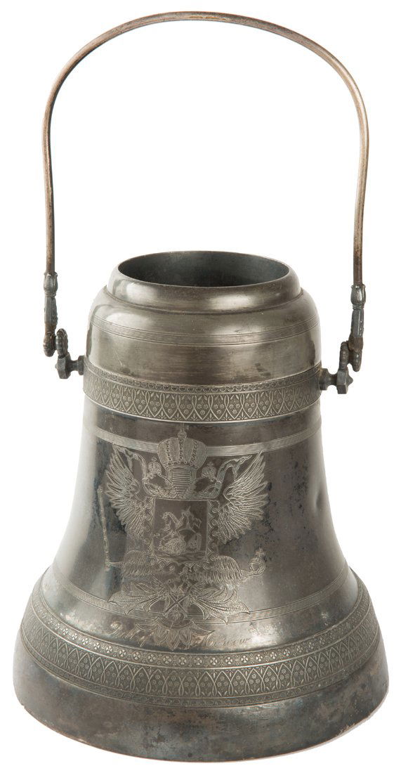 AN AMERICAN SILVERPLATE CHAMPAGNE HOLDER IN THE FORM OF (1 of 2)