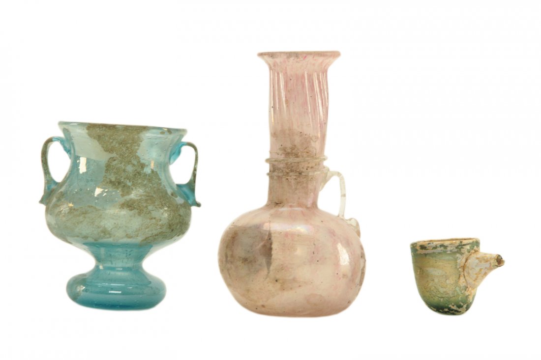 Roman Glass 3 pieces: Roman Glass 3 pieces - Sizes:Pink Glass Flask: H 6"Light Blue Glass Jar: H 4"Green Glass Baby Feeder: H 1.75" x D 1.5"