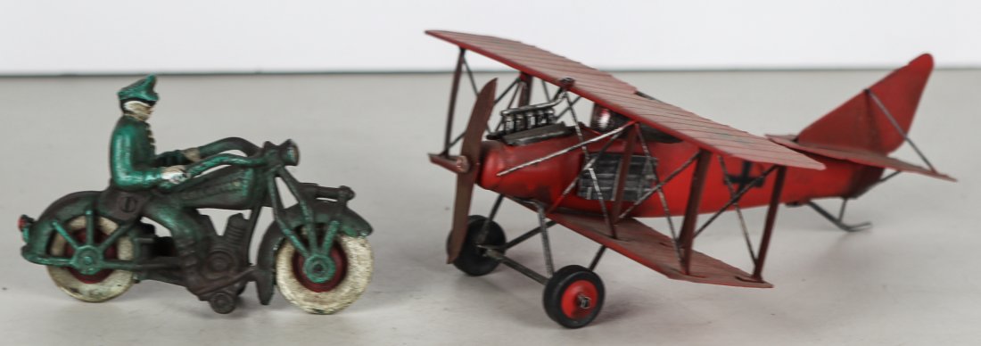 Vintage Miniature Airplane and Biker: Vintage Miniature Airplane and Biker