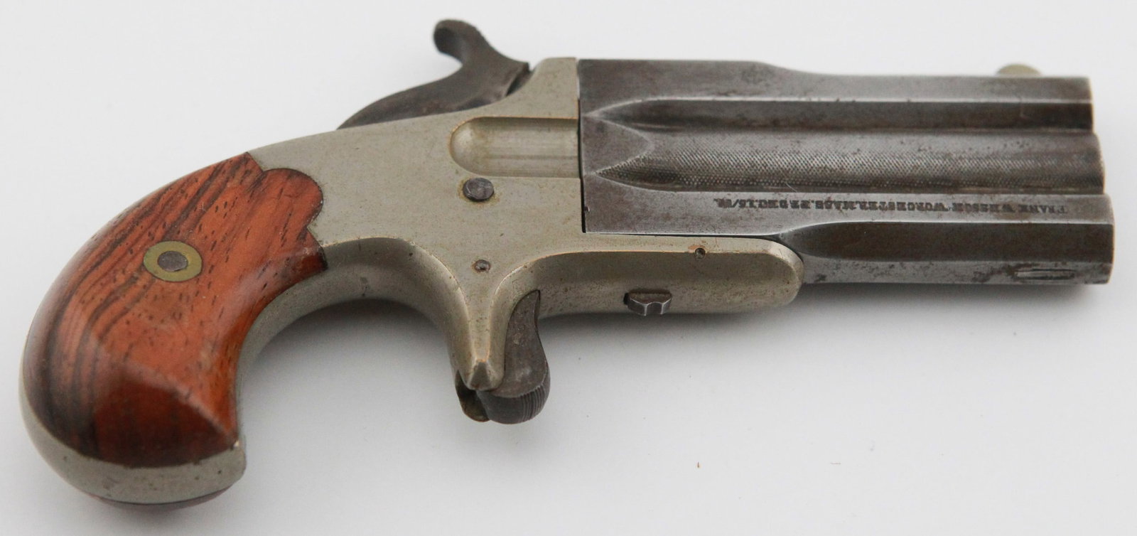 Frank Wesson Swivel Breech Double Barrel Pistol, circa 1868- 1880: The Frank Wesson Swivel Breech Double Barrel Pistol, crafted by the renowned Frank Wesson, stands as a hallmark of mid-19th century firearm innovation and craftsmanship. Its unique swivel breech mecha
