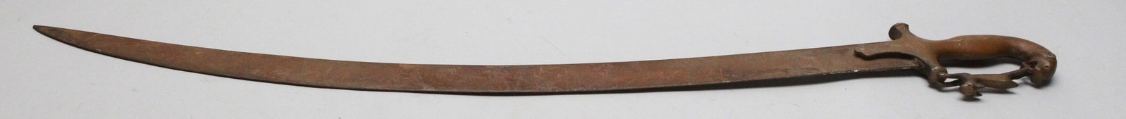 Indian Shamshir curved sword, circa 19th century: This stunning shamshir is a beautiful piece of history, shaped over centuries by Persian craftsmanship. Influenced by the Turkic Seljuk Khanate in the 12th century and the Mongol invasion in the 13th 