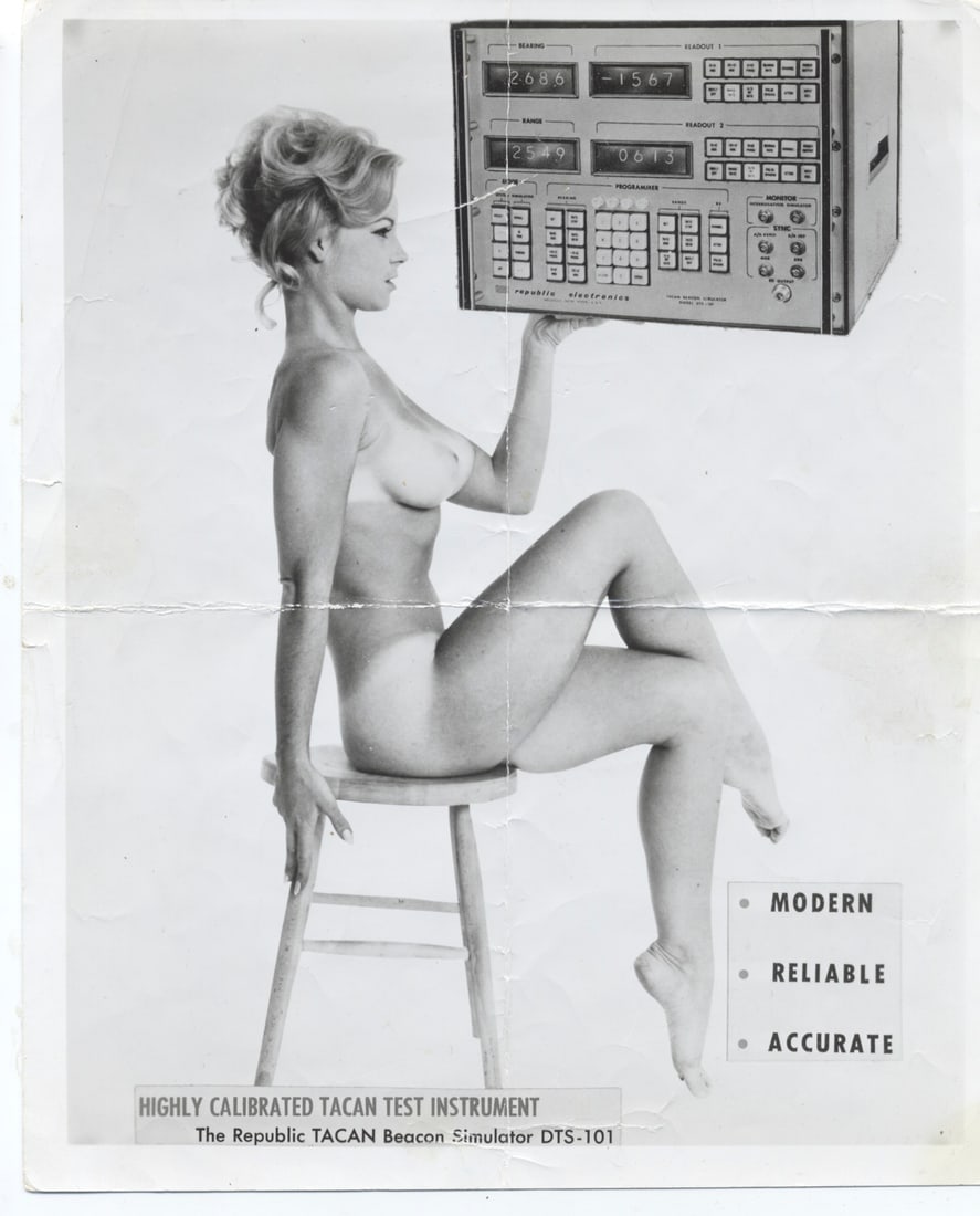 Vintage Artistic Nude Photography: This 8x10 inch photograph features a woman posing with a TACAN (Tactical Air Navigation) test instrument. She is sitting on a stool, holding the instrument in front of her, which adds a unique contras