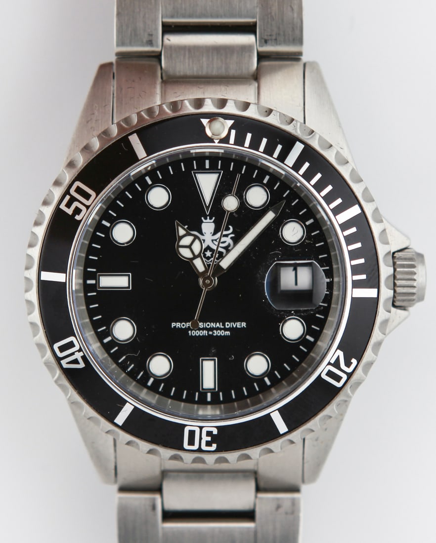 Men Diver Watch Swiss Quartz: The watch featured is a robust Swiss quartz diver watch, designed for professional use with a water resistance up to 1000 feet (300 meters). It features a durable stainless steel case and band, a unid