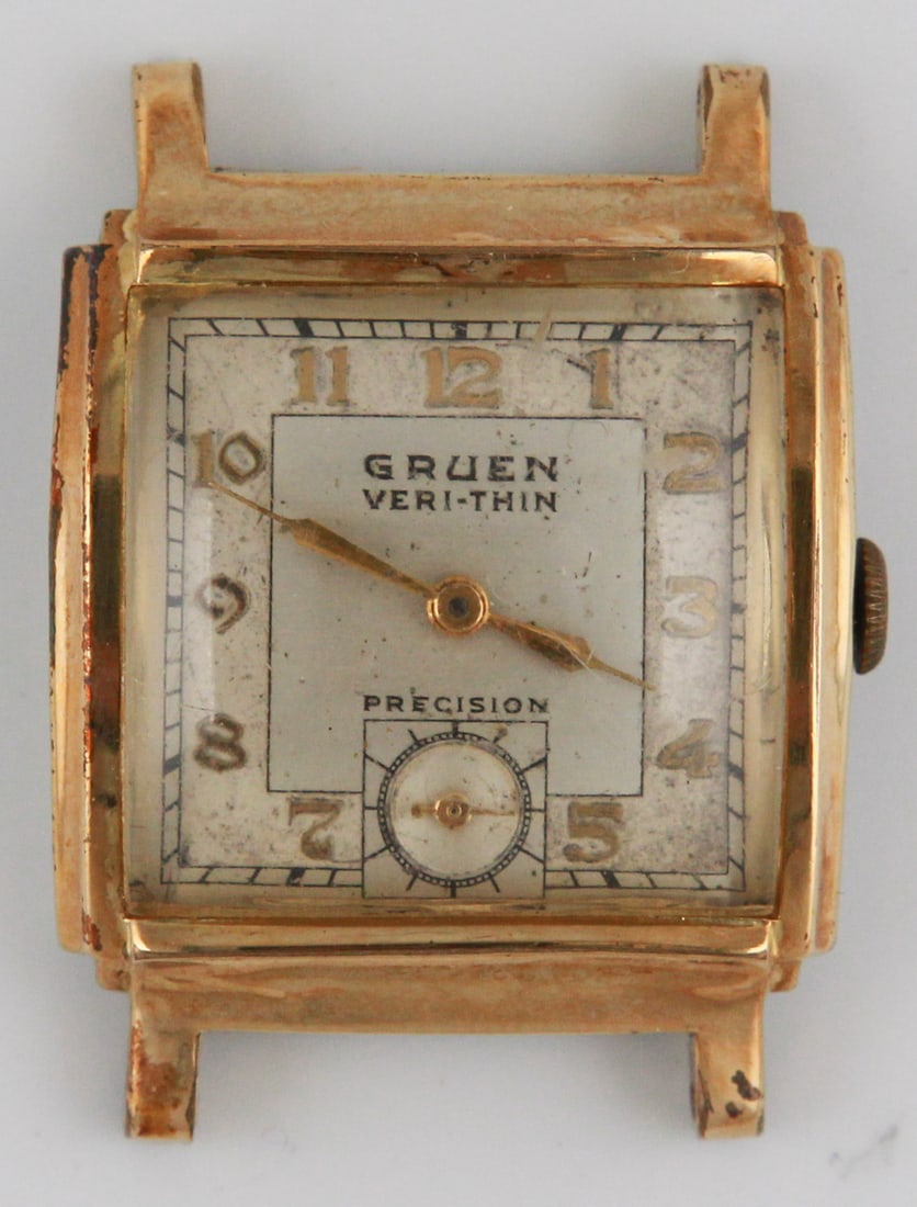 Gruen Veri-Thin Precision Wristwatch (1930s): Vintage Gruen Veri-Thin Precision wristwatch from the 1930s. All original parts, though not currently running. The dial has aged naturally, showing signs of wear but still retains its Art Deco style.