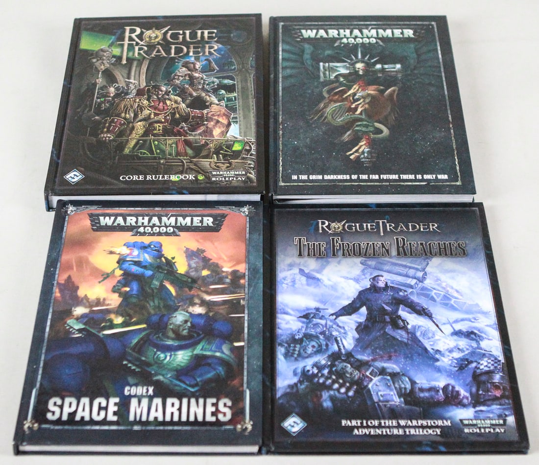 Lot of 4 Warhammer 40,000 Roleplay books: Lot of 4 Warhammer 40,000 Roleplay books including Rogue Trader Core Rulebook, Warhammer 40,000 Rulebook, Codex: Space Marines, and Rogue Trader: The Frozen Reaches. A great addition for fans of the W