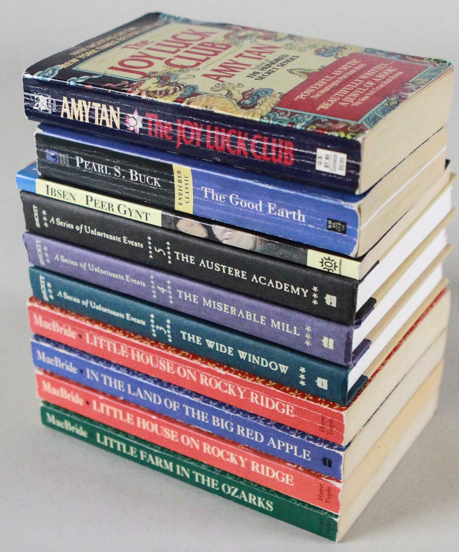 Lot of 10 Books Fiction and Children's Literature: This collection includes ten books spanning fiction and children's literature. Titles featured are The Joy Luck Club by Amy Tan, The Good Earth by Pearl S. Buck, Peer Gynt by Henrik Ibsen, The Austere