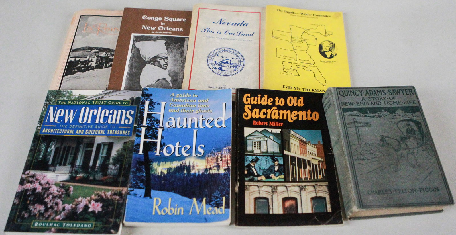 Lot of 8 Books Travel, Haunted Hotels & Historical Guides: This collection includes a diverse mix of travel, history, and cultural guides. Titles include The National Trust Guide to New Orleans, Haunted Hotels by Robin Mead, Guide to Old Sacramento by Robert 