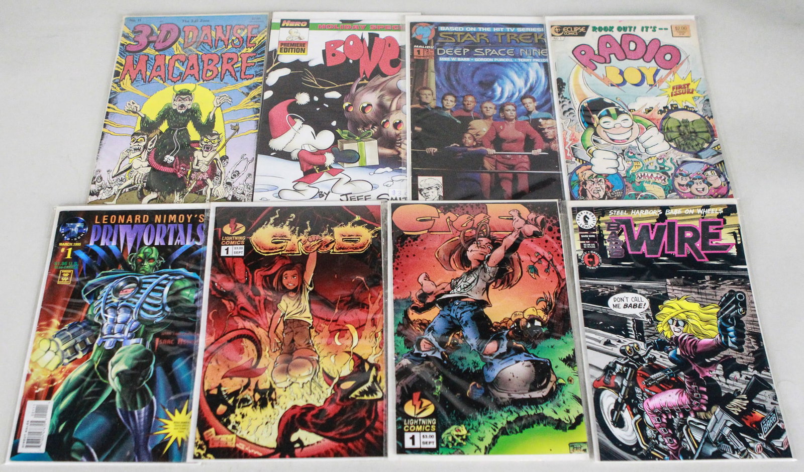 Lot of 8 Independent and Sci-Fi Comics Including Bone and Star Trek: Collection of 8 diverse comic books, including Bone Holiday Special, Star Trek Deep Space Nine #1, Leonard Nimoy’s Primortals #1, 3D Danse Macabre, Grub, The Wire, and more. This lot features a mix 