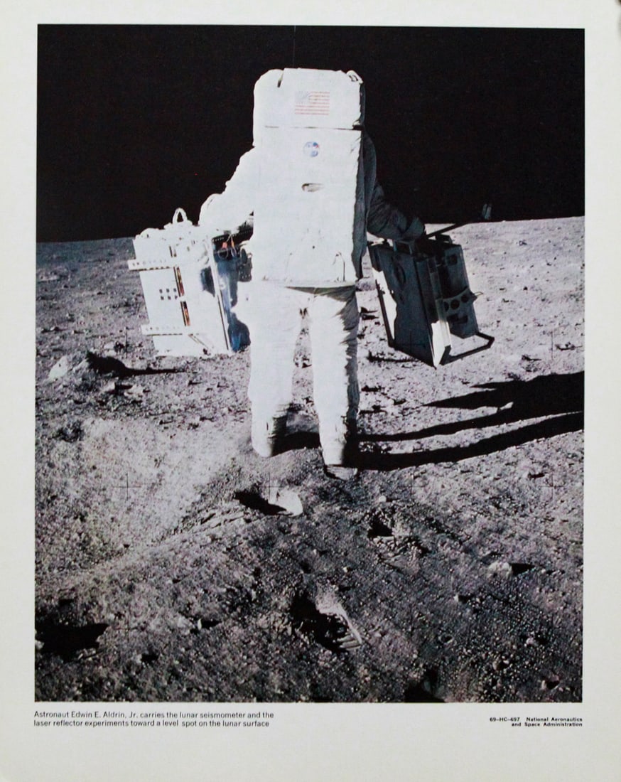 Astronaut Edwin E. Aldrin, Jr. Carries the Lunar Seismometer (1 of 3)