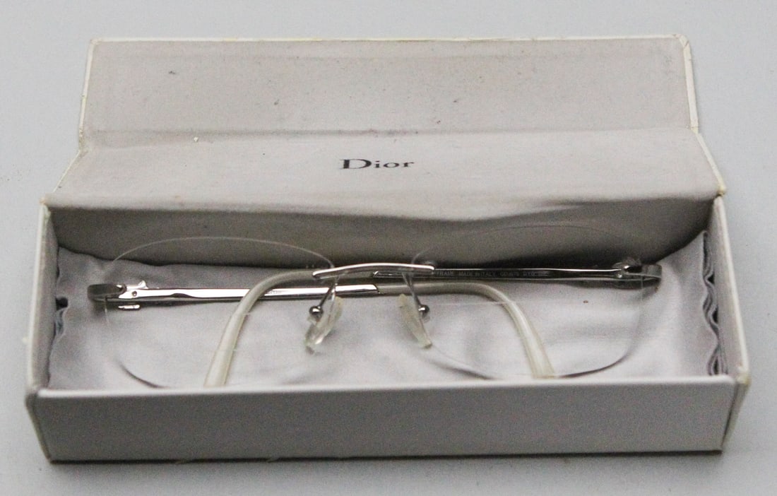 Vintage Christian Dior Model 3675 Women's Reading Glasses: This elegant pair of vintage Christian Dior Model 3675 women’s reading glasses features a sleek, rimless design perfect for achieving your office siren dreams, complete with the original Dior box me