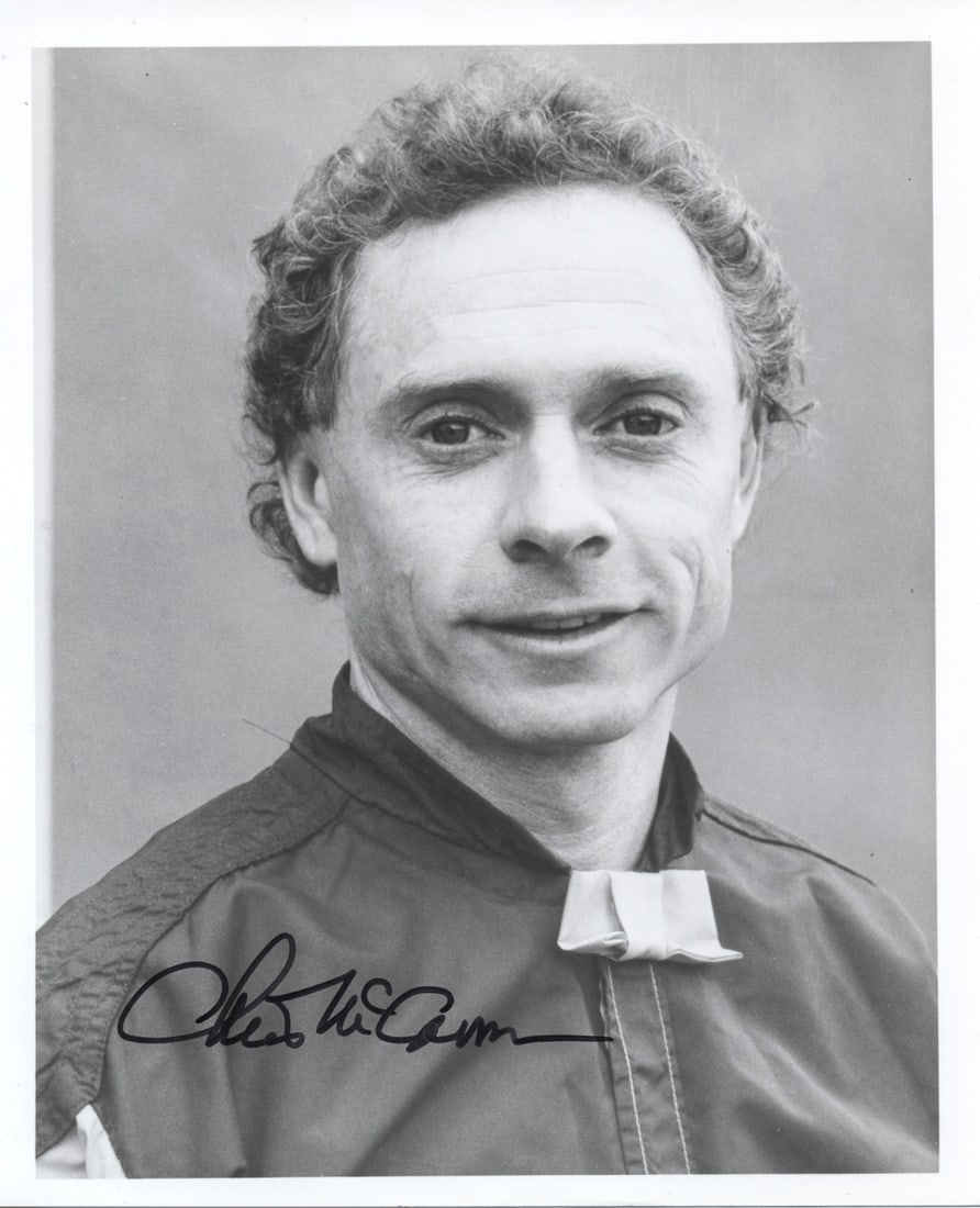Chris McCarron / Signed 8x6 Black-and-White Jockey Portrait: Classic 8x6 black-and-white headshot of Hall of Fame jockey Chris McCarron, shown in his silks and bowtie, boldly signed across the lower left in black ink. A clean, sharp portrait of one of the sport