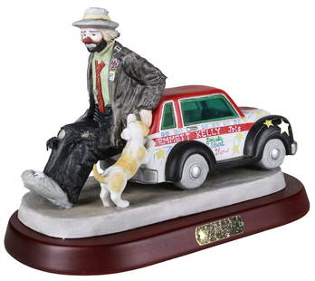 Emmett Kelly Jr. Limited Edition Figurine – 35th Anniversary "Daredevil Motor Thrill Show": This highly collectible Emmett Kelly Jr. figurine commemorates the 35th Anniversary of his famed “Daredevil Motor Thrill Show” and depicts the beloved clown seated beside a vibrantly painted