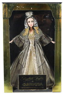 1999 Elizabeth Taylor as Cleopatra Barbie – The Elizabeth Taylor Collection (NRFB): This 1999 Elizabeth Taylor as Cleopatra Barbie from Mattel’s Elizabeth Taylor Collection commemorates one of the most iconic performances in cinematic history. Elegantly sculpted in the actress’s