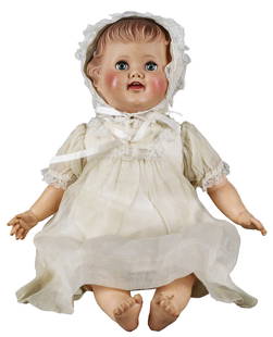 Vintage Rubber Baby Doll with Sleep Eyes – 18" in Christening Gown: This charming vintage rubber baby doll measures approximately 18" x 9" x 4" and features a sweet expression with rosy cheeks, molded hair, and sleep eyes that open and close. She is dressed in a delic