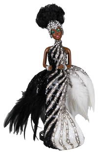 Starlight Splendor Barbie Doll by Bob Mackie with Original Sketch: This dazzling "Starlight Splendor" Barbie doll, designed by the legendary Bob Mackie, showcases an extravagant black and white sequined gown adorned with dramatic feather flourishes and pearlescent ac
