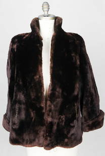 Vintage Cerbotai Women's Dark Brown Fur Coat: This vintage Cerbotai women's fur coat exudes classic Parisian elegance with its deep brown plush fur exterior and signature “Dessin Originel du Salon Cerbotai&rdquo; Eiffel Tower label. The coat fe