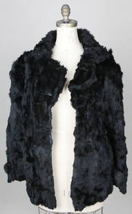 Women’s Vintage Fur Coat, Size L – Circa Late 20th Century: This stylish women's vintage fur coat offers luxurious warmth and soft texture, crafted in a classic cut with a black exterior and sleek nylon lining. Labeled as a size Large, this coat features a 21"