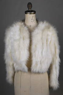 Women’s Vintage Faux Fur Coat – Size Small: This vintage women's faux fur coat offers a classic cropped silhouette in a soft off-white hue with a plush texture and elegant styling. Made in Taiwan, R.O.C., and tagged as size small, the coat