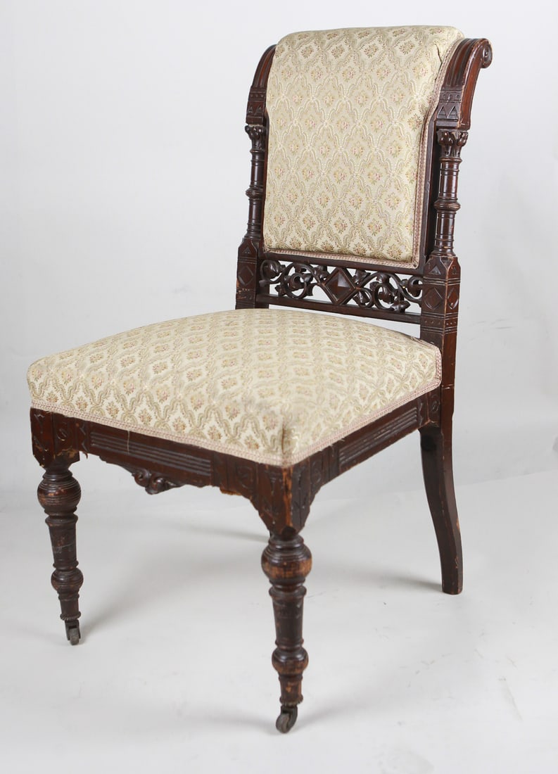 Antique Edwardian Carved Wood Upholstered Dining Chair – Warner Bros. Studios Prop: A beautifully crafted antique Edwardian dining chair featuring ornate carved wood detailing and floral jacquard upholstery in soft beige and rose tones. The chair measures approximately 36 x 17 x 21 i