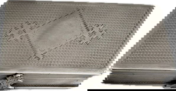 Antique Russian Sterling Silver Cigarette Case by Kosima Volkov, 1898 Kiev: This exquisite antique Russian sterling silver cigarette case, crafted by Kosima Volkov in 1898 in Kiev, features a finely engine-turned surface with an ornate central motif, displaying a rich texture