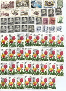 Lot of 61 Worldwide Stamps – U.S. Tulips, South Africa, Canada & More: This colorful lot of 61 stamps includes a strong showing of U.S. 29¢ tulip stamps (over 40), alongside a varied international mix featuring South African RSA issues with architectural, wildlife, and