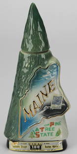 Vintage Beam “The Pine Tree State” Maine Bourbon Whiskey Decanter: This empty vintage Beam decanter is a charming ceramic bottle in the shape of a pine tree, commemorating the state of Maine with “The Pine Tree State” motif and gold-outlined state map.