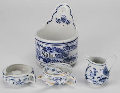 Blue Onion German Porcelain Assortment – 4-Piece Set: This charming 4-piece collection of German porcelain features traditional "Blue Onion" style designs, including a wall-mounted salt box, small lidded pot, creamer, and an open dish. Each item