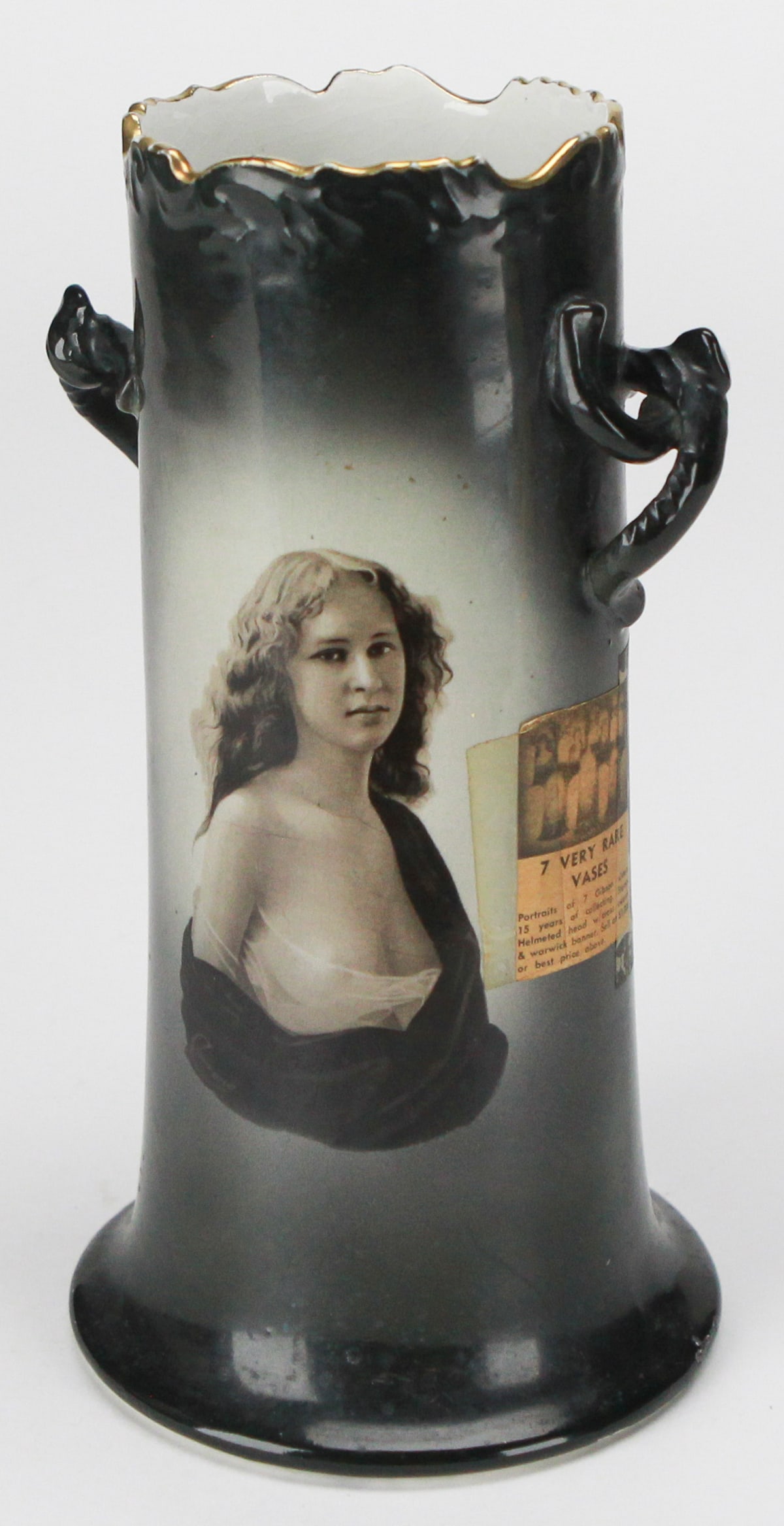 Warwick Ioga Vase with Gibson Girl Portrait, c.1900s: This rare Warwick Ioga portrait vase features a striking image of a Gibson Girl, rendered in soft sepia tones against a deep gradient black background. Made in the early 20th century, the vase measure