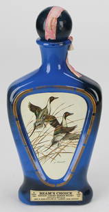 Beam's Choice Collector’s Edition Bottle (Volume XVII) – The Pintail by James Lockhart: This Beam's Choice Collector's Edition Volume XVII bottle features a detailed wildlife painting by renowned American artist James Lockhart, known for his accurate and expressive portrayals of nature.
