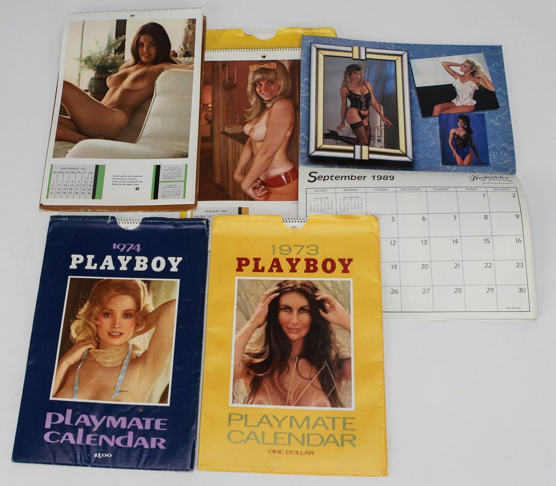 Lot of 5 Vintage Erotic Calendars – Playboy & Frederick’s of Hollywood (1970s–1980s): This lot includes five vintage erotic pin-up calendars, featuring three Playboy Playmate calendars from 1973, 1974, and 1983, one undated but similar in style, and one Frederick’s of Hollywood calen