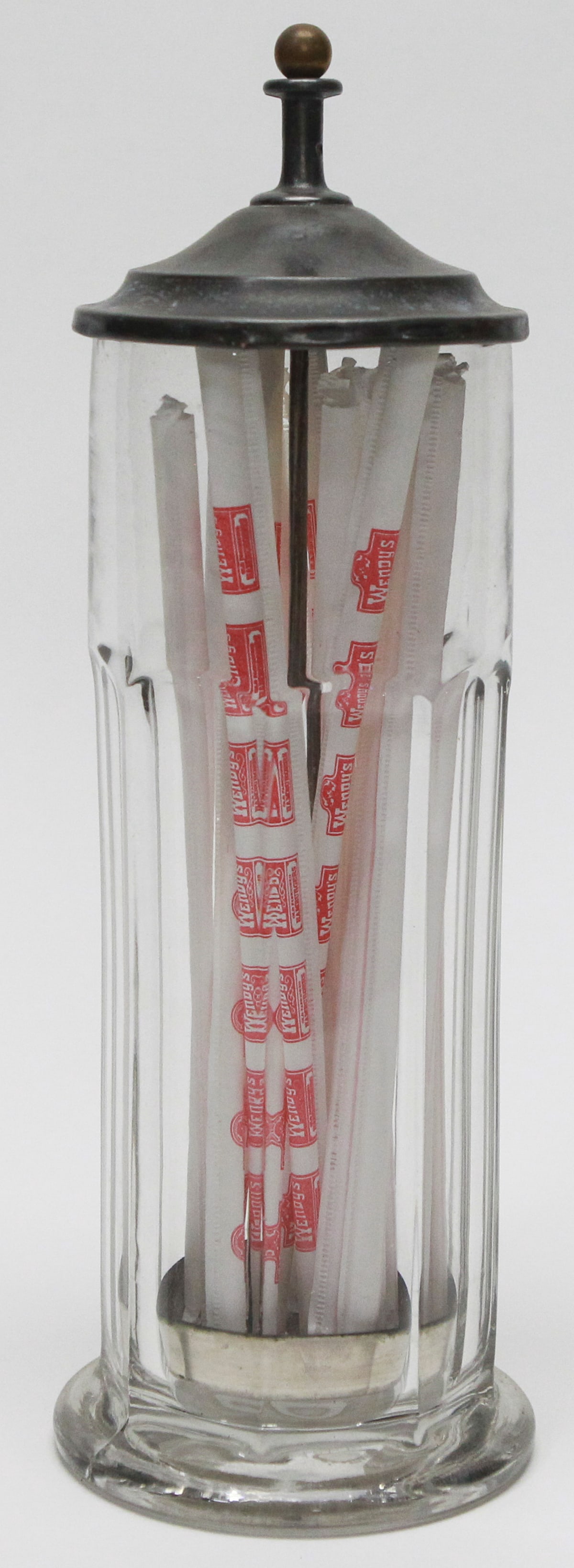 Vintage Glass and Metal Lift-Top Straw Holder: Vintage glass and metal lift-top straw holder/dispenser featuring a ribbed clear glass body with a metal lid and spring-loaded lift mechanism that raises the drinking straws for easy access. Includes 