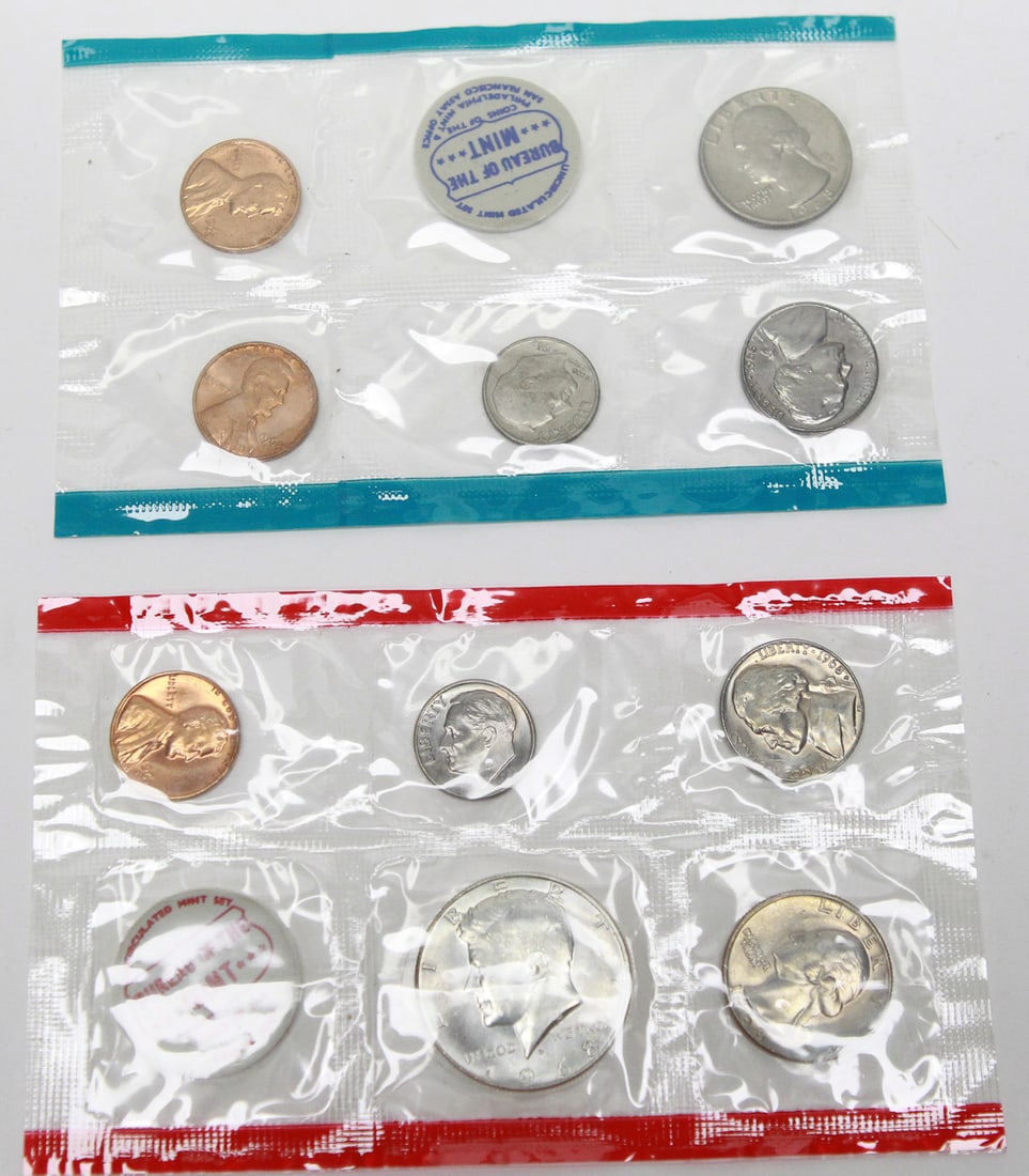 1968 U.S. Mint Uncirculated Coin Set: Original 1968 United States Mint Uncirculated Coin Set consisting of both Philadelphia (red seal) and Denver (blue seal) mint cellophane packs with original Bureau of the Mint tokens. The set includes