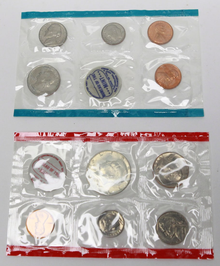 1970 United States Uncirculated Mint Set: Original 1970 United States Uncirculated Mint Set in the official U.S. Mint cellophane packaging, complete with both the Philadelphia (red seal) and Denver (blue seal) packs. The set includes all 10 c
