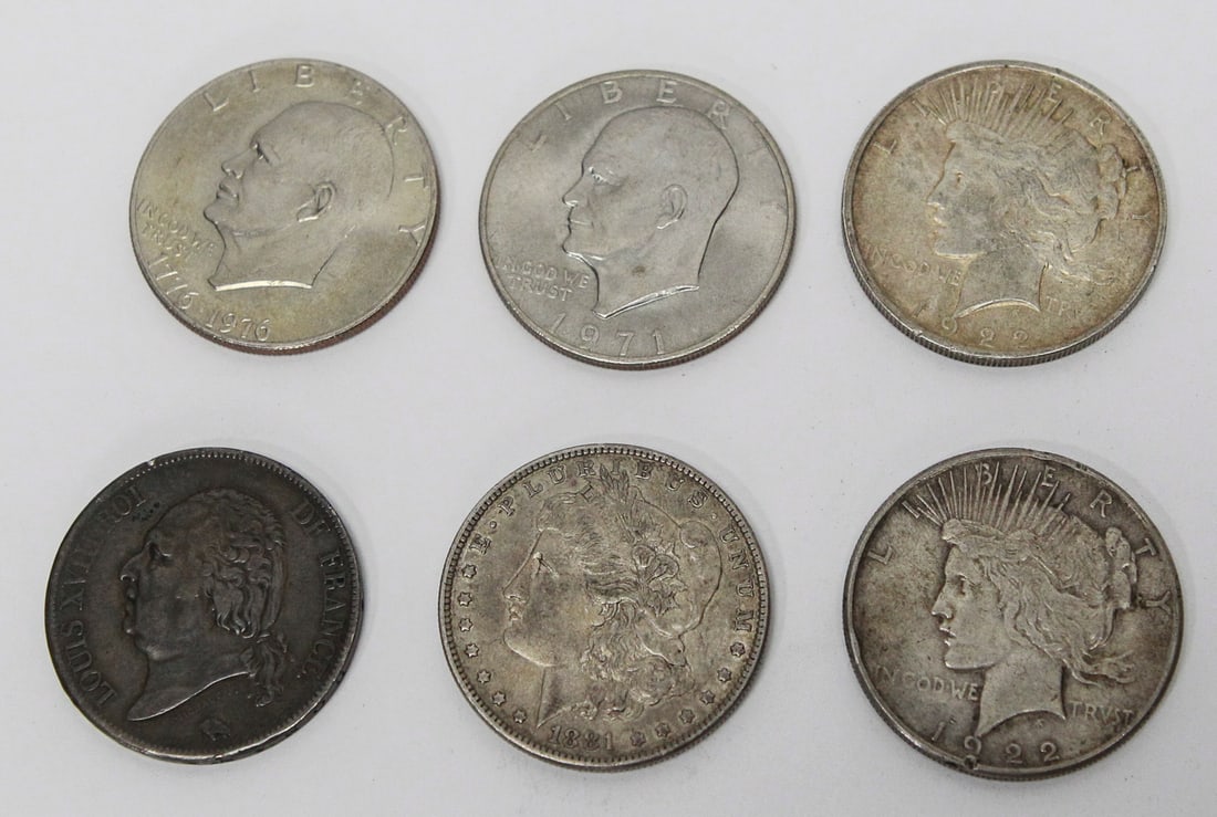 Mixed U.S. & World Silver Dollar Coin Lot: Lot of six vintage coins including U.S. Eisenhower Dollars (1971 and 1976 Bicentennial), two Peace Silver Dollars (1922 and 1923), an 1881 Morgan Silver Dollar, and an 1819 French 5 Francs coin featur