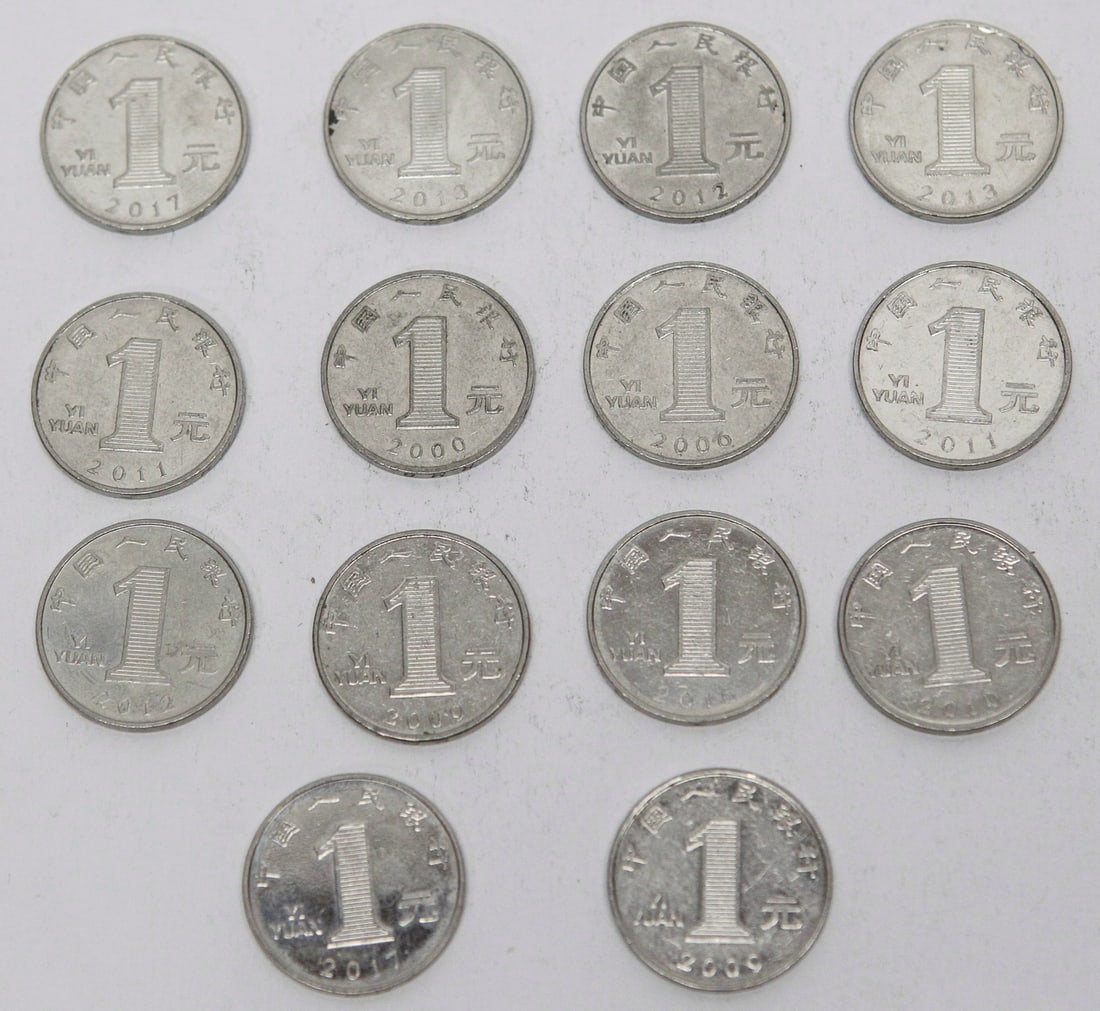 Lot of 14 Chinese 1 Yuan Chrysanthemum Coins: Lot of 14 People's Republic of China 1 Yuan coins featuring the Chrysanthemum flower obverse and the denomination reverse. The group includes mixed dates, including examples from 2000, 2008, 2009,