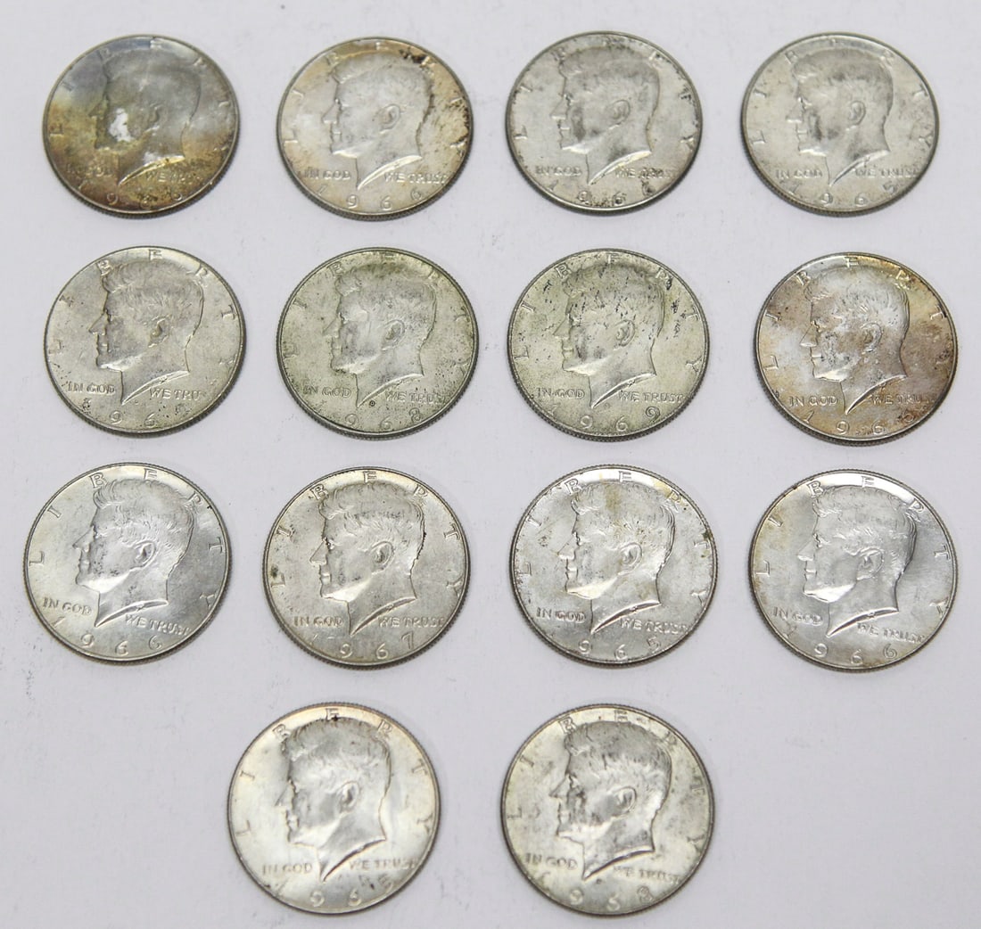 Lot of 14 Kennedy Half Dollar Coins – 1965–1969: Lot of 14 United States Kennedy Half Dollar coins dated 1965 through 1969. All coins are the desirable 40% silver composition issued after the 1964 silver transition, featuring the presidential