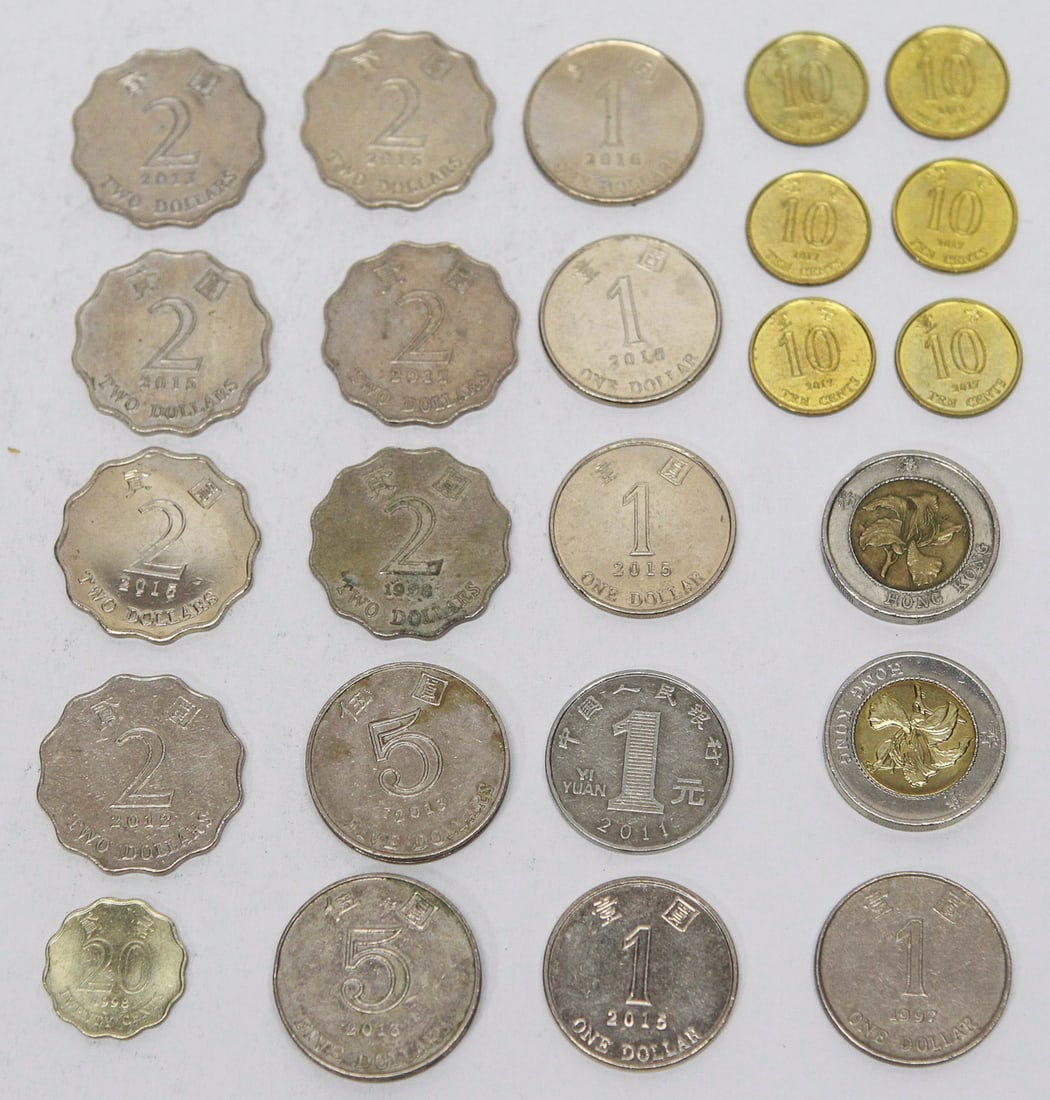 Lot of 25 Hong Kong & Chinese Coins: Mixed lot of 25 Hong Kong and Chinese coins featuring a variety of modern denominations and dates. The lot includes Hong Kong $10 bi-metallic coins, $5, $2, $1, 20¢ and 10¢ coins with the Bauhinia