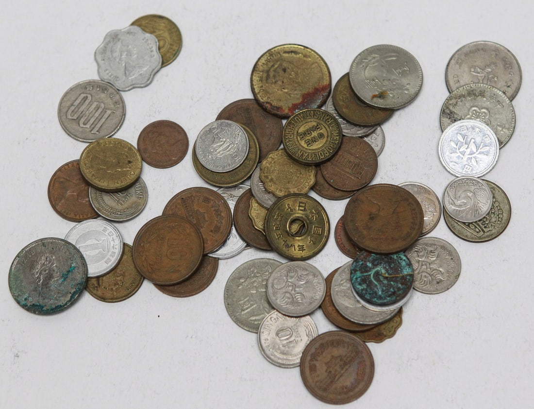 Lot of 50 Assorted World Coins, Asian Coins, and Tokens: Lot of approximately 50 assorted world coins and tokens featuring a variety of countries with an emphasis on Asian issues. Includes coins from Japan, Hong Kong, Taiwan, Singapore, Korea, and other