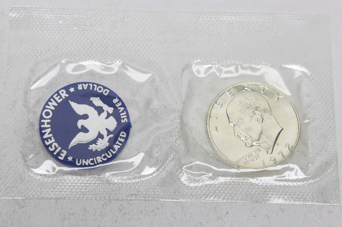 1972-S Eisenhower Silver Dollar Uncirculated in Original U.S. Mint Sealed Packaging: Original 1972-S Eisenhower Silver Dollar struck in 40% silver and preserved in its original U.S. Mint sealed plastic packaging with the blue Eisenhower Silver Dollar token. This San Francisco Mint