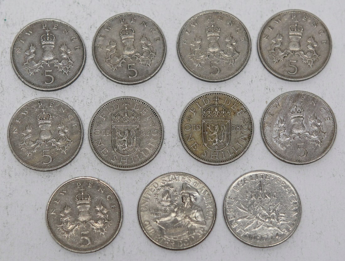 Lot of 10 World Coins: Lot of 10 assorted world coins featuring six Great Britain 5 New Pence coins with Queen Elizabeth II portraits, two British One Shilling coins (1958 and 1962), one 1971 French 1 Franc, and one United