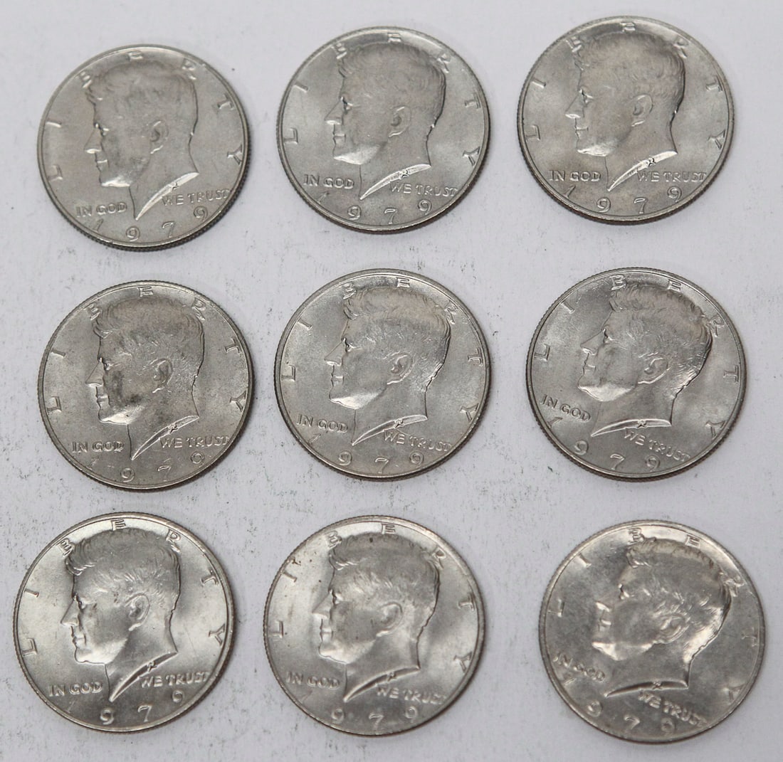 Lot of 9 Brilliant Uncirculated 1979 Kennedy Half Dollars: Lot of nine 1979 United States Kennedy Half Dollar coins, all appearing to be brilliant uncirculated examples with strong original luster and sharp details. Each coin features the portrait of