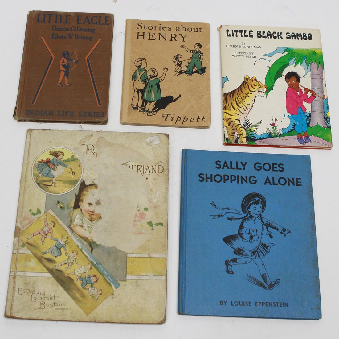 Vintage Children's Book Lot of 5: Lot of five vintage children's books including Little Eagle by Therese O. Deming and Edwin W. Deming, Stories about Henry by Tippett, Little Black Sambo by Helen Bannerman, Mother Goose in Wonderland