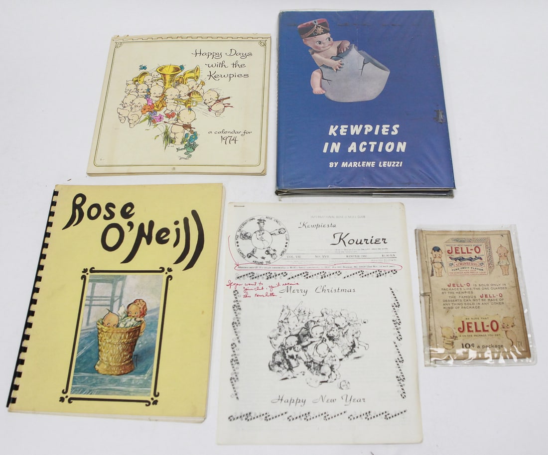 Kewpie Collectibles Lot of 5: Lot of five Kewpie collectibles including Kewpies in Action by Marlene Leuzzi, Happy Days with the Kewpies 1974 calendar, a Rose O'Neill illustrated reference booklet, a Kewpiesta Kourier newsletter,